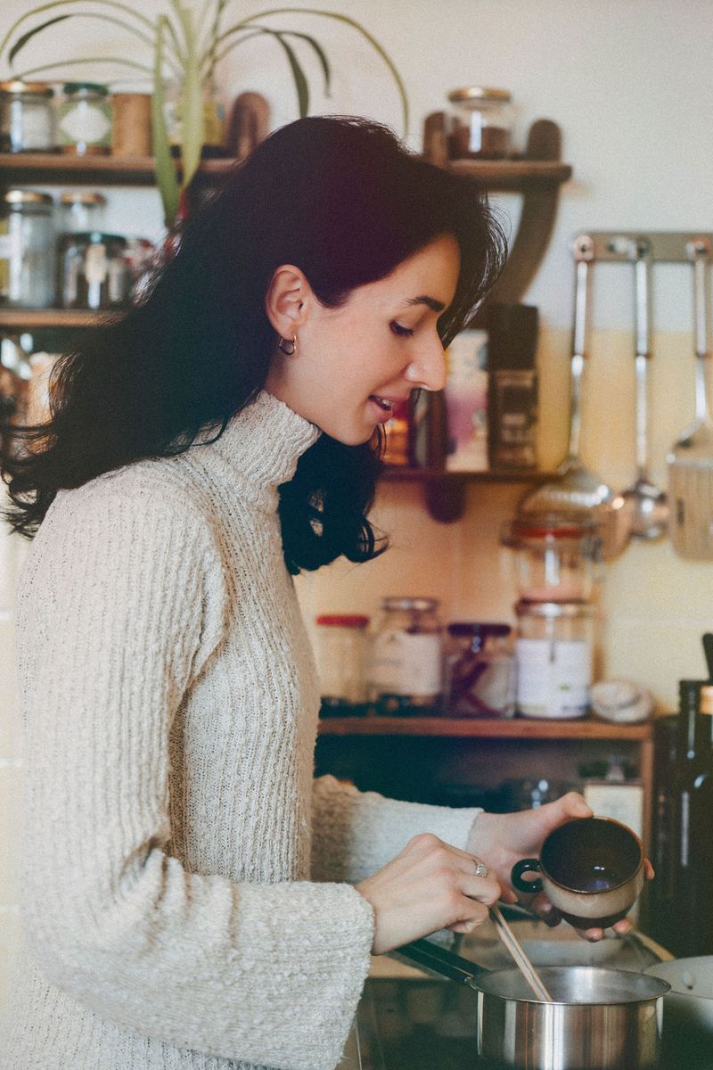 Zsofia cooking in her kitchen