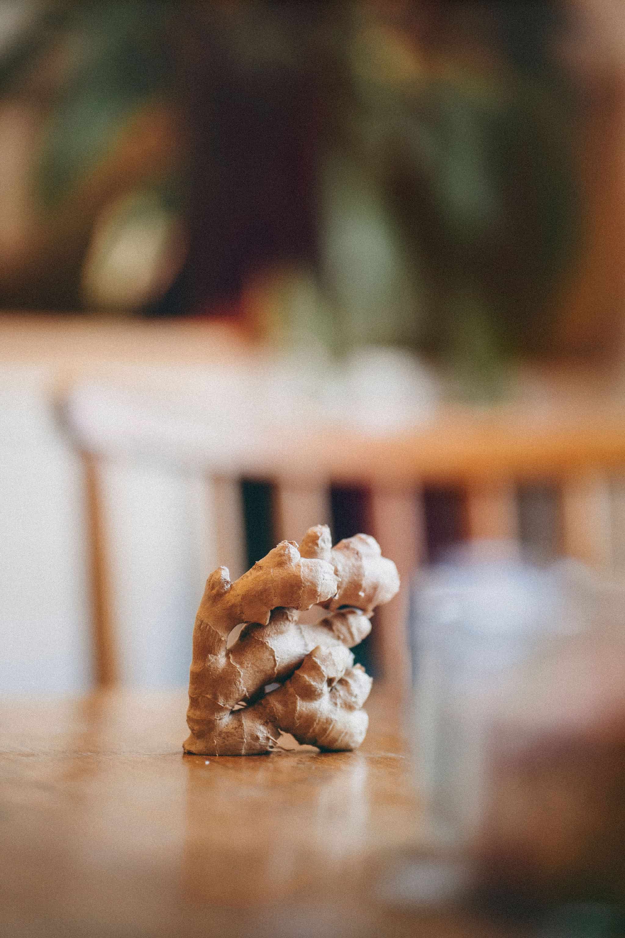 Fresh ginger root on a wooden table