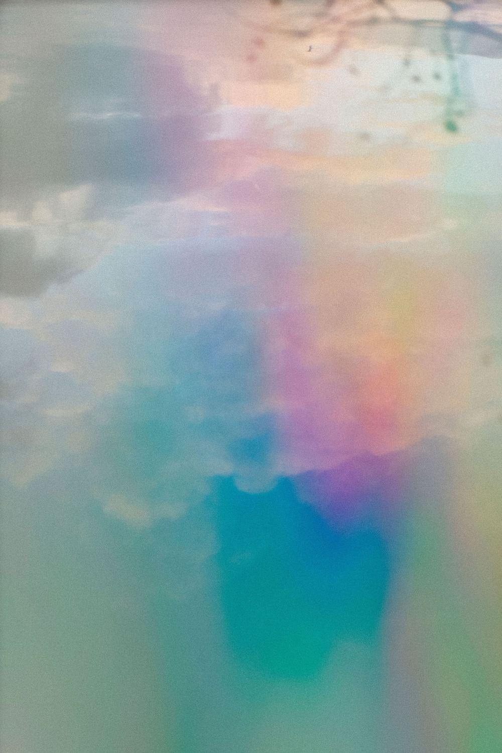 Soft light in pastel colours, refracted on water